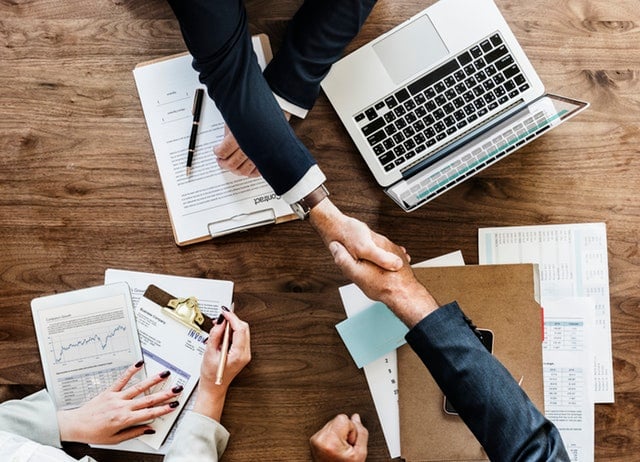 business sales marketing handshake deal